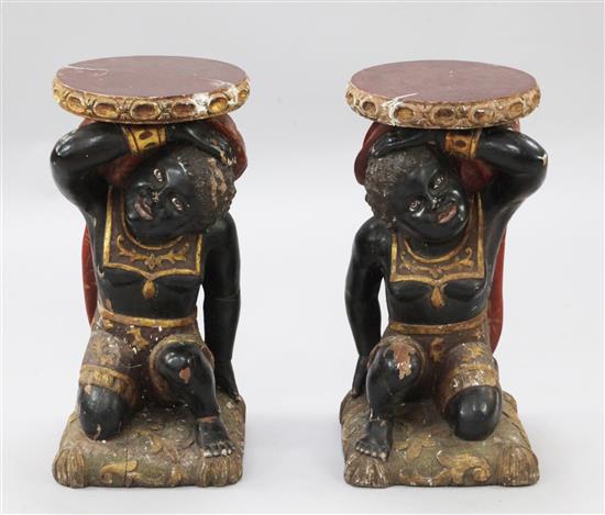 A pair of 19th century Venetian parcel gilt blackamoor pedestals, H.2ft 1in. Diam. 1ft